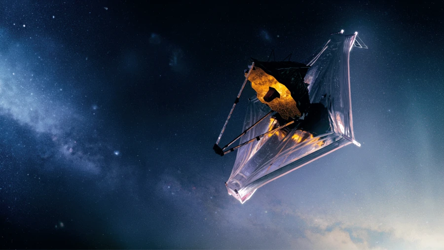 詹姆斯·韦伯太空望远镜悬浮于布满星云与繁星的深邃宇宙空间中