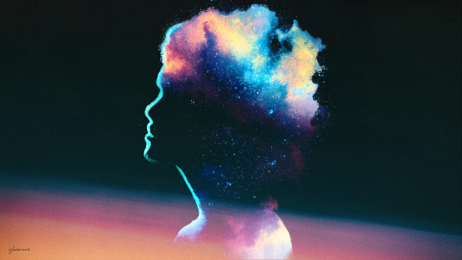 深色背景下，星云幻化成女性侧脸轮廓，卷发由多彩星云构成。