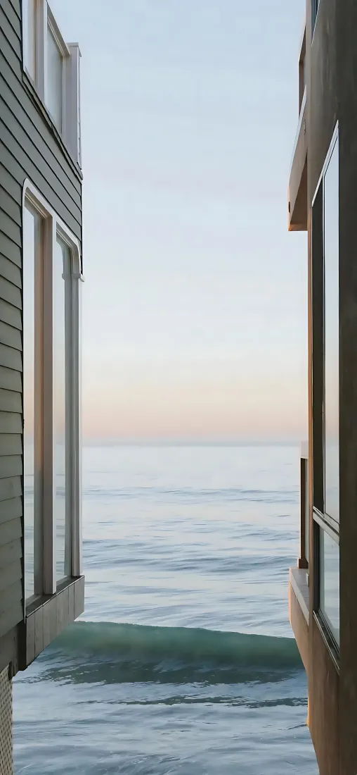 海边建筑｜窗外海景背景图片 - 两楼夹缝静谧海面「哲风壁纸」