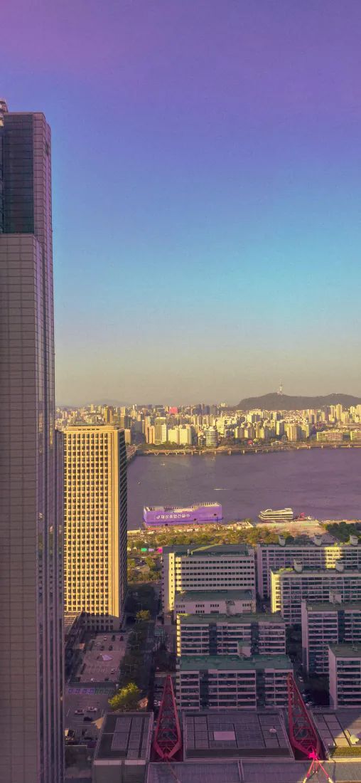 城市天际线手机壁纸｜黄昏江景建筑群背景图片 - 紫调浪漫风光「哲风壁纸」