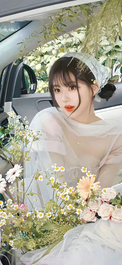 纯欲少女手机壁纸｜花束旁白衣女生背景图片 - 清新治愈氛围「哲风壁纸」